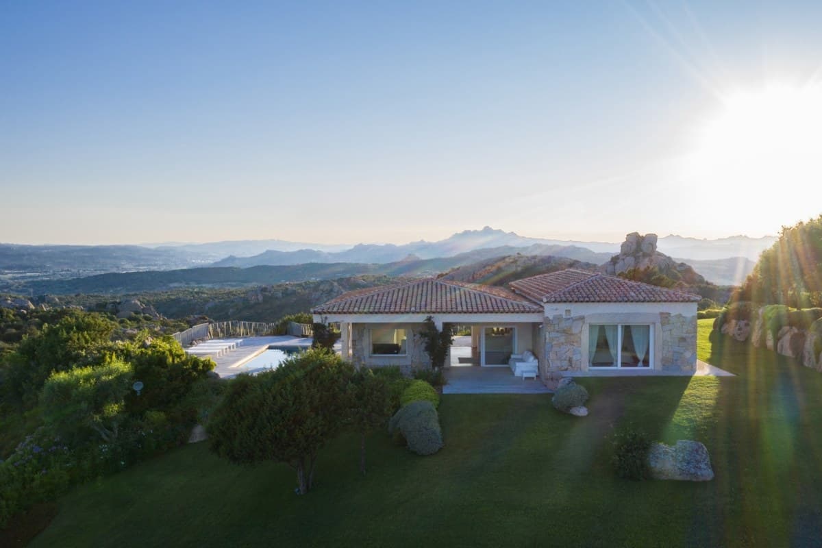 Aerial view over the granite hills and coastline near Villa Horizon